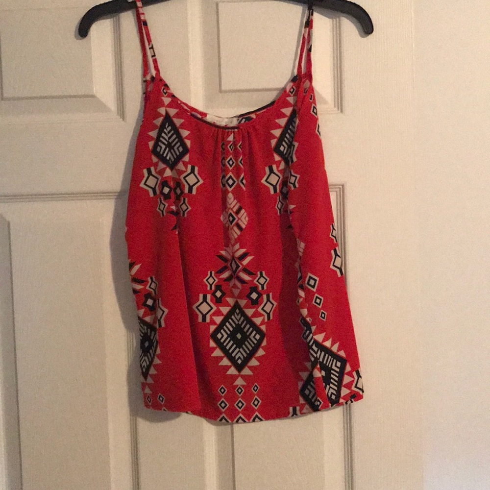Red, white, and black tank top